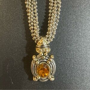 Silver Tone Multi-strand Necklace with Citrine Colored Pendant.
